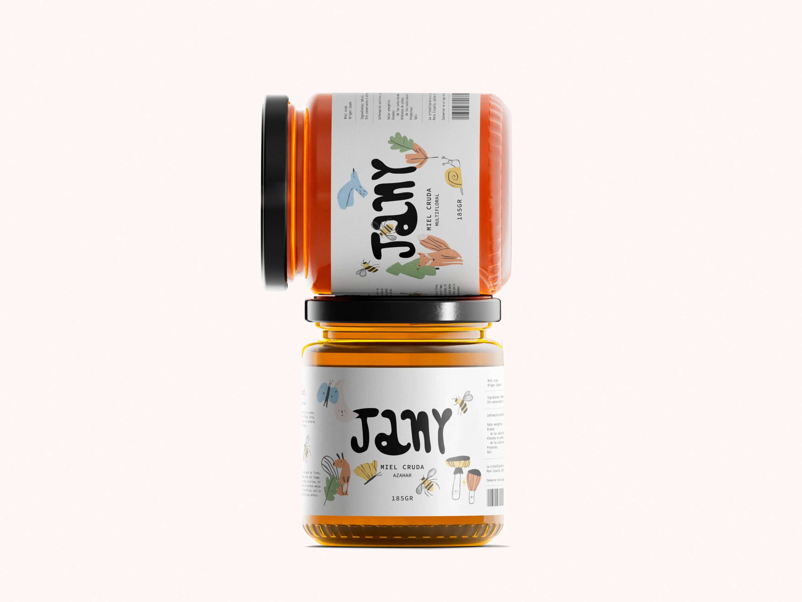 Dos tarros de miel Jany apilados en equilibrio sobre fondo claro.